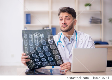 Young male doctor radiologist working in the clinic Young male doctor radiologist working in the clinic 106710781
