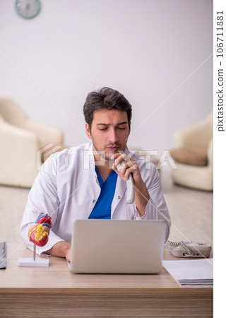 Young male doctor in telemedicine concept Young male doctor in telemedicine concept 106711881
