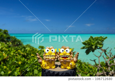 Okinawa blue sea and Shisa Okinawa blue sea and Shisa 106712680