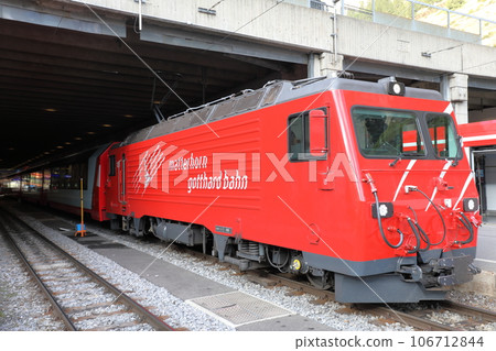 Glacier Express locomotive stopping at Zermatt station Glacier Express locomotive stopping at Zermatt station 106712844
