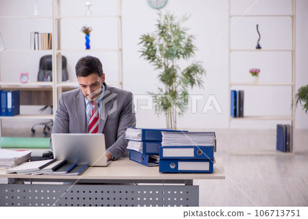 Young male employee working in the office Young male employee working in the office 106713751