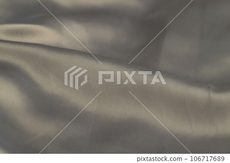 part of the fabric from beige-colored clothing 106717689