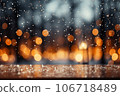 blurred bokeh background with lots of lights and reflective sparkles 106718489