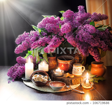 Still life from food and lush lilac boquet Still life from food and lush lilac boquet 106719686
