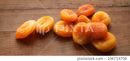 Dried fruits on a wooden table Dried fruits on a wooden table 106719706