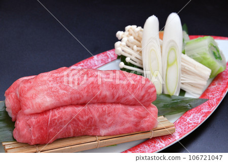 Sukiyaki hotpot with marbled Japanese black beef and seasonal vegetables Sukiyaki hotpot with marbled Japanese black beef and seasonal vegetables 106721047