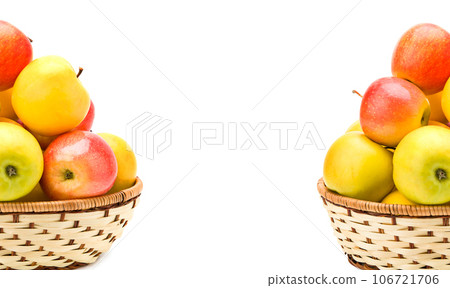 Apples in basket isolated on white . Wide photo. Free space for text. Collage. 106721706