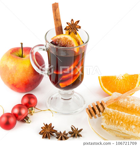 Mulled wine, honey, fruits and spices isolated on a white . Mulled wine, honey, fruits and spices isolated on a white . 106721709