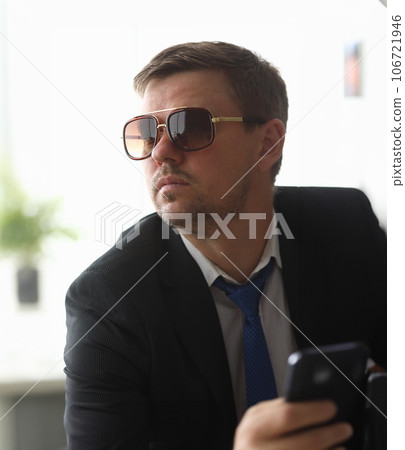 Man in black sunglasses Man in black sunglasses 106721946