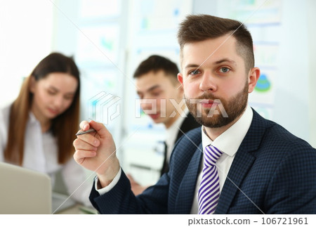 Concentrated man in office 106721961