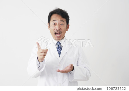 A middle-aged doctor with inspiration, white background 106723522