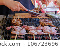 Whole roasted quail at a food stall 106723696
