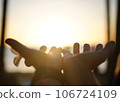 sunset and hands 106724109