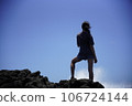 girl standing on the mountain top 106724144