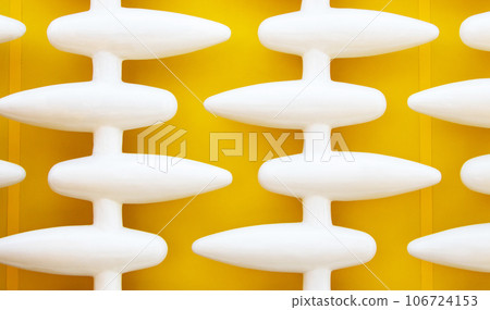 White or grey plastic textured background abstract has a rough surface. Oval structure Embossed, same pattern, yellow background. attached to the House wall for background or website wallpaper. 106724153