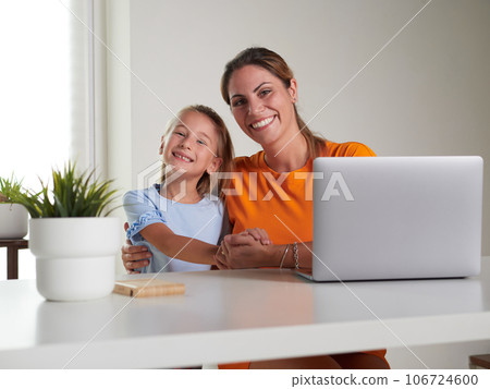 happy mother and daughter at home 106724600