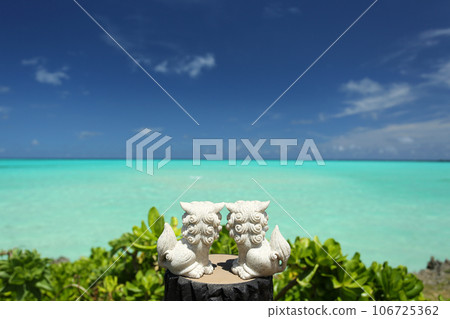 Okinawa Shisa staring at the blue sea 106725362