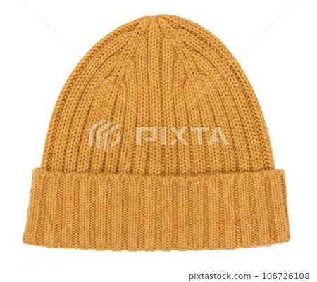 Orange knit winter bobble hat isolated on white Orange knit winter bobble hat isolated on white 106726108
