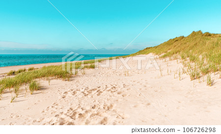 Sylt island beach under a blue sky on a sunny day Sylt island beach under a blue sky on a sunny day 106726298