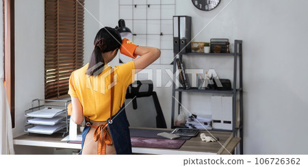 Housekeeping concept. tired asian woman or housewife bucket full of cleaning stuff at home Housekeeping concept. tired asian woman or housewife bucket full of cleaning stuff at home 106726362