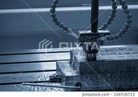 The EDM machine working process with graphite electrode. The EDM machine working process with graphite electrode. 106726723