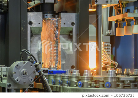 The drinking water bottle manufacturing process by blow mold machine. The drinking water bottle manufacturing process by blow mold machine. 106726725