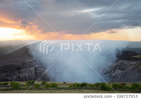 White smoke coming from volcano crater White smoke coming from volcano crater 106727053