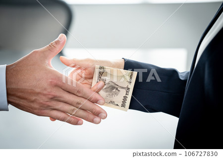 Hands of a man and woman handing over money Hands of a man and woman handing over money 106727830