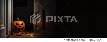 Halloween pumpkins in a spooky empty house, dark mysterious background. AI generated. 106728219