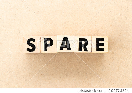 Alphabet letter block in word spare on wood background 106728224