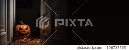 Halloween pumpkins in a spooky empty house, dark mysterious background. AI generated. 106728565