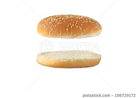 Sesame bun for burger top and bottom separated side view isolated on white 106729172