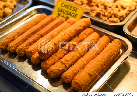 Fried cheese sausages in the street food Jalan Alor in Kuala Lumpur 106729743