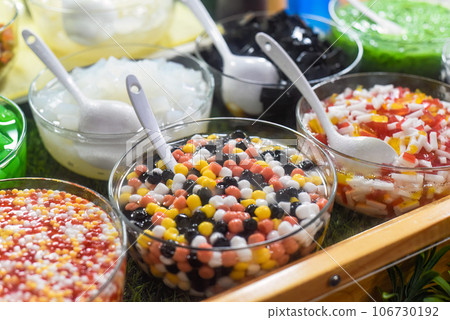 Many Thai tea additives in Jalan Alor street food in the Kuala Lumpur market Many Thai tea additives in Jalan Alor street food in the Kuala Lumpur market 106730192