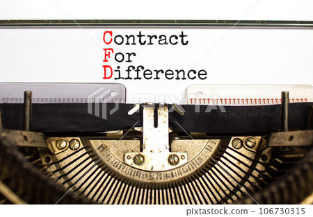 CFD symbol. Concept words CFD contract of difference typed on beautiful retro old typewriter. Beautiful white background. Business and CFD contract of difference concept. Copy space. 106730315