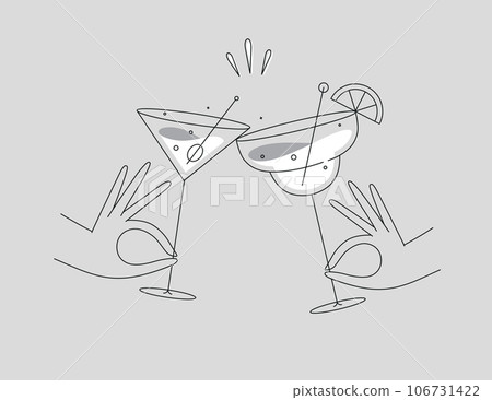 Hand holding margarita and manhattan clink glasses grey 106731422