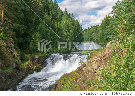 natural landscape with a clear waterfall on a forest water natural landscape with a clear waterfall on a forest water 106731756