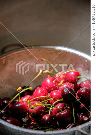 ripe red cherries close up 106732116