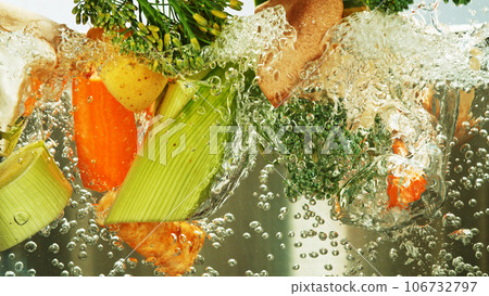 Freeze Motion Shot of Splashing Fresh Vegetable. 106732797