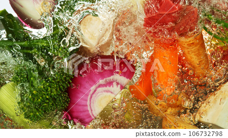 Freeze Motion Shot of Splashing Fresh Vegetable. Freeze Motion Shot of Splashing Fresh Vegetable. 106732798