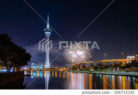 Night view of the Macau Tower with New Year fireworks Night view of the Macau Tower with New Year fireworks 106733192
