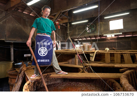 Brewery craftsman who makes miso and soy sauce using wooden barrels, traditional method, brewery image 106733670