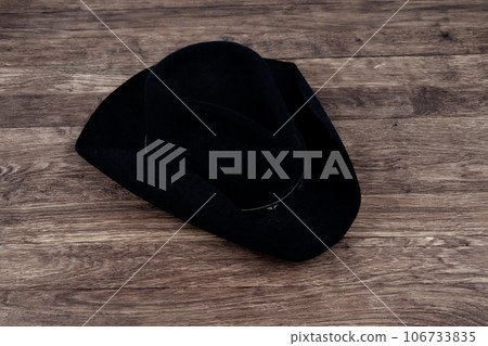 Old west hat on table. Top view. Old west hat on table. Top view. 106733835