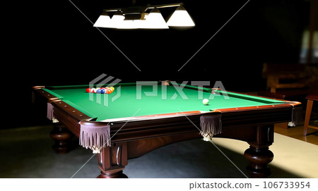 Billiard hundred, sport game. Colored balls, cue on green cloth. Fun competition. AI generated. 106733954