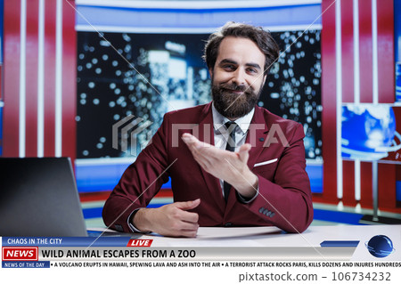 Wild animal escapes from zoo causing panic in city, free wildlife on streets mobilize authorities to help citizens. News reporter on night show presenting latest events, reading headlines. 106734232