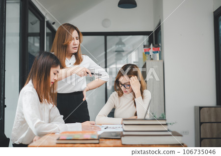 Serious business team leader coach mentor talk to diverse business people in office explain strategy at corporate group meeting, multiethnic staff listen to boss instruct interns at briefing 106735046