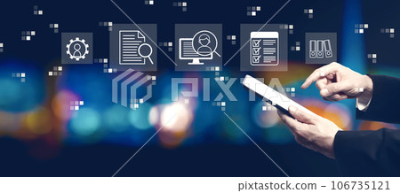Document management system concept with businessman using a tablet computer 106735121