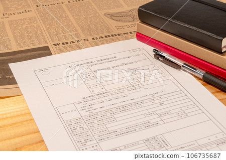Business opening registration form, pen and three notebooks laid out on the desk Business opening registration form, pen and three notebooks laid out on the desk 106735687