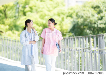 Nurse and female doctor working at a hospital Nurse and female doctor working at a hospital 106736908