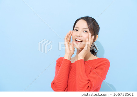 Portrait of a woman in her 20s wearing red clothes 106738501